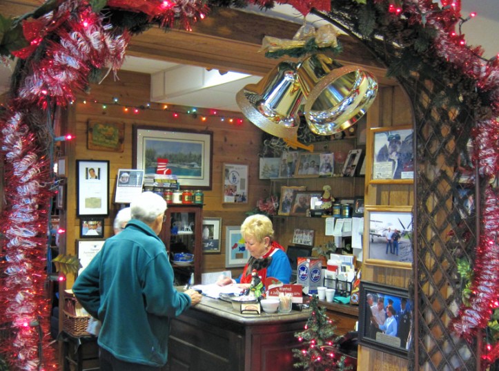 Pat Cannon, of C.J. Cannon's, helps patrons who stopped by for breakfast Sunday morning.  Now in their 29th year, the popular restaurant and lounge is a favorite of locals.  