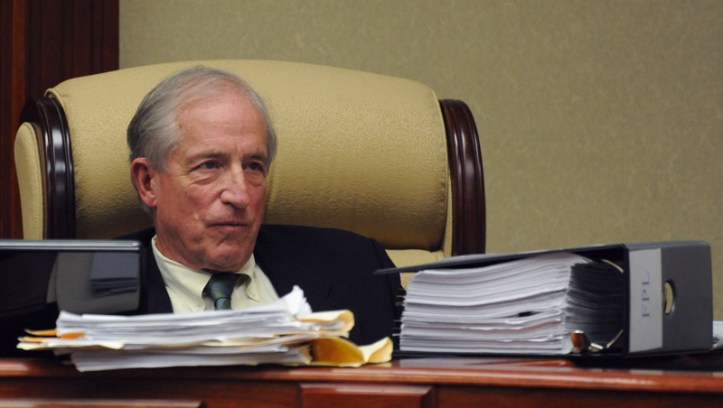 With the proposed purchase and sale agreement between the city and Florida Power & Light, and the FMPA contracts stacked before on the dais, Councilman Richard Winger posed questions and asked for a report from the city's transactional attorney, Rick Miller.  