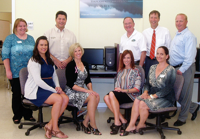Gathering at Harvest’s Life Enrichment Center in Vero Beach are (left to right) front row: Dana Daniels, Treasure & Space Coast Radio, Diana Walker, CenterState Bank, Karen Franke, Treasure & Space Coast Radio, Annabel Robertson, Harvest; back row: Jennifer Costa, Harvest, Geoff Moore and Hamp Elliott, Treasure & Space Coast Radio and Andy Beindorf and Chris Bieber, CenterState Bank.