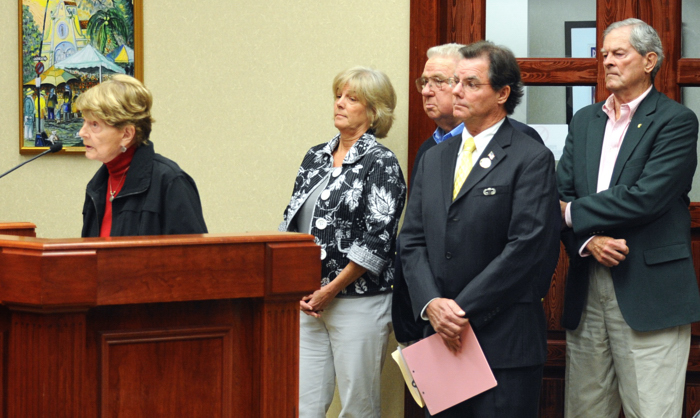 Former Council members Deborah Fromang, BIll Jordan, Ken Diage and Sabe Abell, stook behind Caroline Ginn as she spoke before the Council.  