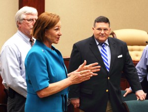 Charlie Wilson, Councilwoman Pilar Turner, Utility Commission Chairman Scott Stradley at the contract signing in Feb. 2013.
