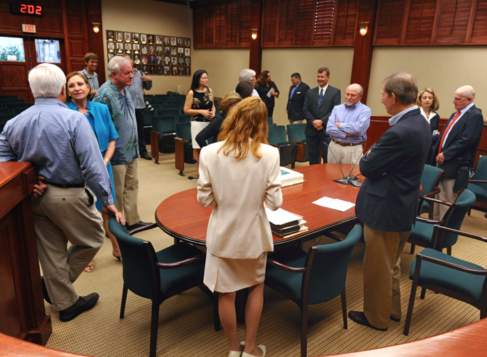 Mayor Craig Fletcher, Vice Mayor Tracy Carroll and Councilwoman Pilar Turner gathered at City Hall today with representatives of FPL and supporters of the sale to formally sign the agreement, which will now go before voters March 12 in a referendum.