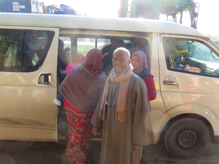 Fifteen people pile in a van for Alexandria