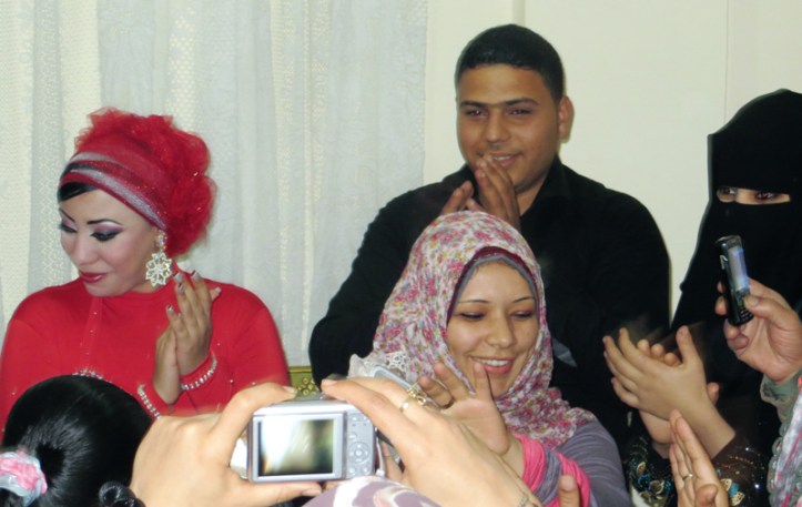 Happy couple in cramped party