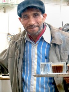 Waiter at coffee shop in Alexandria