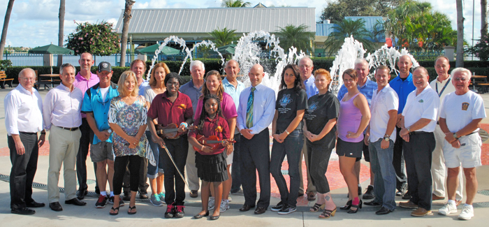 Talent, sponsors, city personnel, organizers and volunteers joined together at the Royal Palm Pointe Fountain to plan the inaugural year of the Holiday Rec Party and Holiday Rec Run 3296-GO!