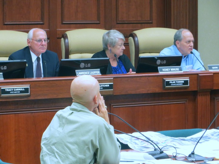 Board members Lawrence Lauffer, Honey Minuse and Mark Mucher; in foreground, Monte Falls, Public Works Director