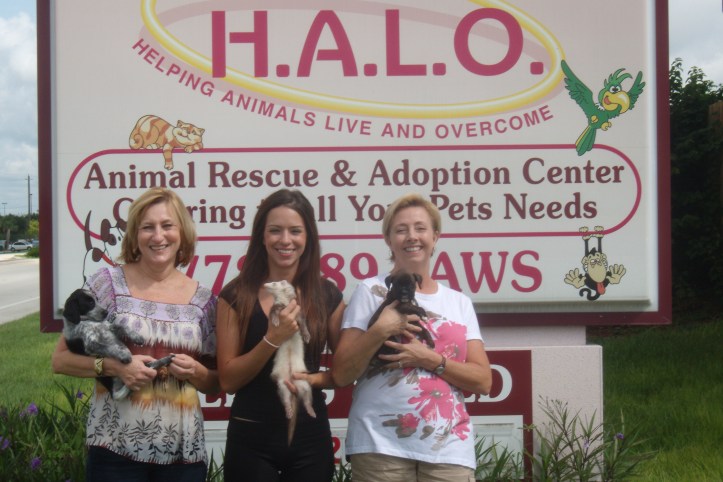 Jacque Patrone (center) with staff and residents