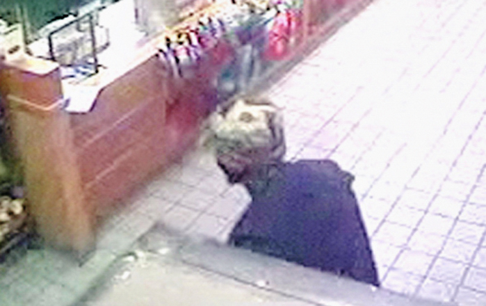 Surveillance photo of suspect in Subway robbery.