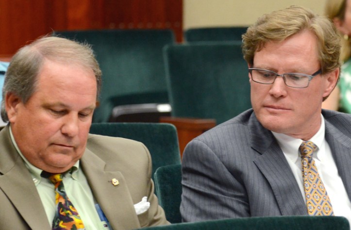 Vice Mayor Tracy Carroll's husband, John, with his attorney Thomas Tierney