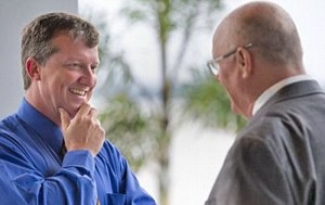 Utility activist Glen Heran and County Commissioner Bob Solari