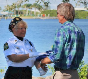 Craig Moore receiving flag