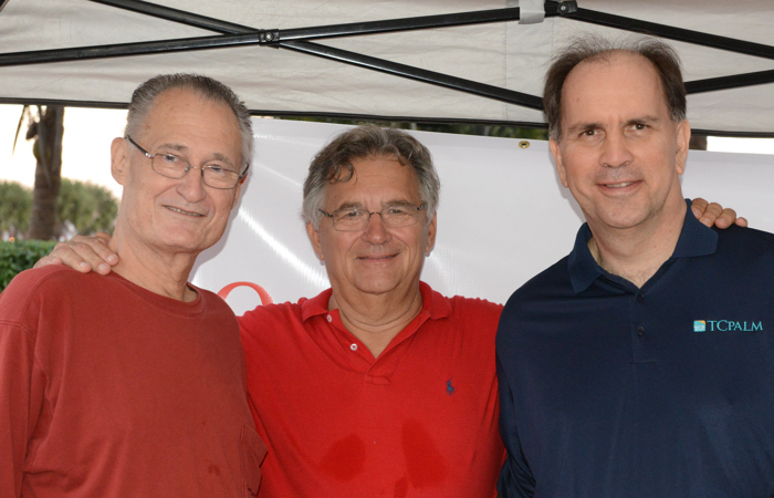 Parade judges Inside Vero associate editor Milt Thomas, Al Benkert of the Oceanside Business Association and Press Journal columnist Russ Lemmon