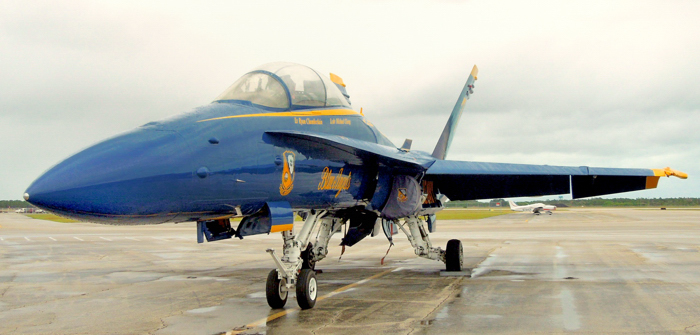 Blue Angel #7’s F/A-18 Hornet dwarfs the Piper Archer behind it at the Vero Beach Municipal Airport