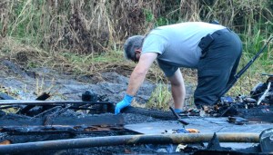 A lieutenant with the the Florida State Fire Marshal's office was sifting through the remains of the home early Tuesday morning looking for clues to the cause of the fire.  