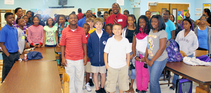 Guest "mentor" speakers often meet with the children at the Gifford Youth Activity Center stressing the importance of getting a good education.