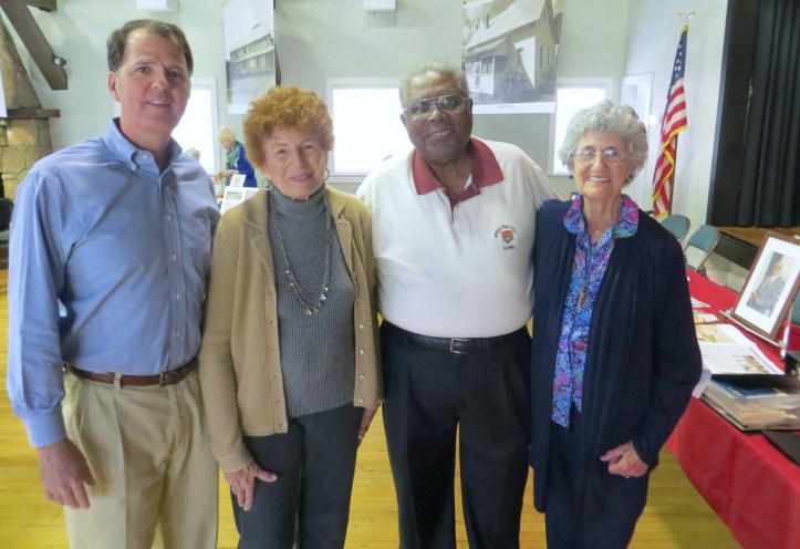B.T. Cooksey, Jr., Suzan Phillips, Godfrey Gipson and Jacquelyn Cooksey, widow of B.T. Cooksey, Sr. at B.T.'s popular historic postcard exhibit