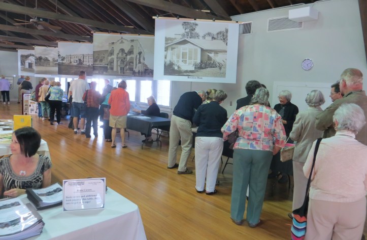 Heritage Celebration attendees, volunteer Cynthia Baita at left