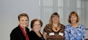 District Adult Winner - Osceola Magnet School: L to R: Dr. Fran Adams, Superintendent; Carol Johnson, School Board Chairman; District Adult Outstanding Volunteer Michele Murphy; and Osceola Magnet Principal, Kathleen Goldstein.