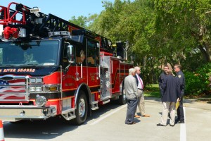 Gerry Weick, Brian Barefoot, Mark Shaw, Mike Jacobs, Richard Haverland In front of the Town's new $750,000, 75-food ladder truck.