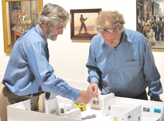 Williams with Walter Wick in April, looking at the scale model of Holmes Gallery and discussing the final layout of works of art in his summer exhibition.