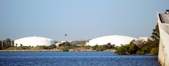 Who should bear the cost, if the waterfront is to be "liberated" of a a wastewater plant that is far from having exhausted in useful life?