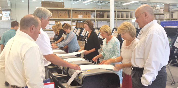 Judge David Morgan, County Commissioner Bob Solari, and representative, Catherine Cook from the Division of Elections were present to witness the Logic & Accuracy Test, which was held in the warehouse of the Supervisor of Elections Office.   