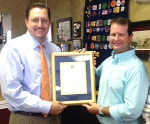 Exchange Club of Indian River president David Walker honored Todd Howder, 2014 Vero Beach Air Show president, in honor of his contributions to the community.