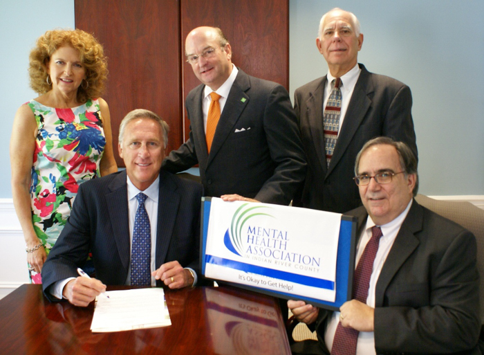 Kerry Bartlett, Executive Director of the Indian River Community Foundation, along with Mental Health Association Board Members Ken Felten, Earl Morgan and Sam Block, and Executive Director Dr. Bob Brugnoli, witnesses the establishment of an endowment fund to support the MHA in perpetuity.