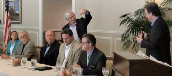 Though Charlie Wilson did not bring a fan to the Taxpayers Association candidate forum, he found a way to break the rules. When reminded by moderater, Taxpayers Association President, John Kistler, that under the ground rules for the forum participants were not to attack each other by name, Charlie Wilson walked over to Vice Mayor Jay Kramer and simply pointed to him. 