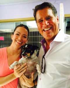 Founder Jacque Petrone with supporter Randy Yeager and a very adoptable Jack Russell mix.
