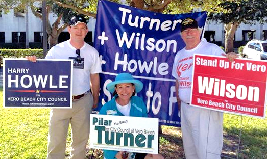 This pictures of Harry Howle, III, Pilar Turner and Charlie Wilson campaigning together near the Library was posted on Wilson's Facebook page.