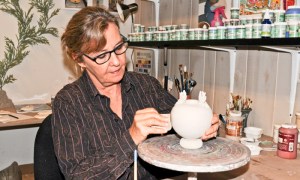 Glenda Taylor working in her studio on 14th Avenue