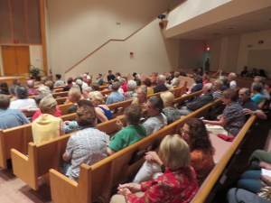 Attendees at CompassionVero film showing in Emerson Center