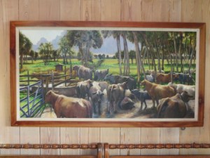 Cattle scene painted on the back of his truck