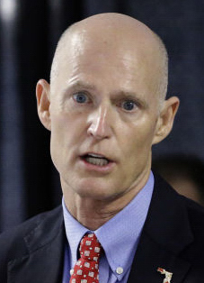 Gov. Scott, who won a second term in November, has repeatedly said he is not convinced that climate change is caused by human activity, despite scientific evidence to the contrary.