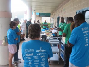 Freddie Woolfork of the Gifford Youth Achievement Center briefs clean up volunteers