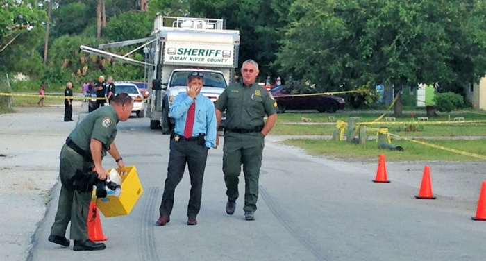 Detectives from the Indian River County Sheriff's Office at the scene of Dominique Dawson's murder. 