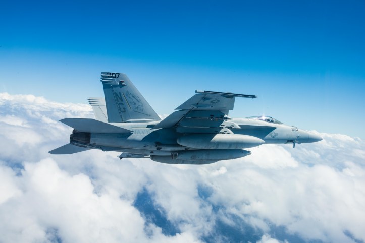 160211-N-GZ947-004 PACIFIC OCEAN (Feb. 10, 2016) ÐAn F/A-18E Super Hornet assigned to the Warhawks of Strike Fighter Squadron (VFA) 97 flies a mission. Providing a combat-ready force to protect collective maritime interests, USS John C. Stennis (CVN 74) is operating as part of the Great Green Fleet on a regularly scheduled Western Pacific deployment. (U.S. Navy photo by Mass Communication Specialist 3rd Class Kenneth Rodriguez Santiago / Released)